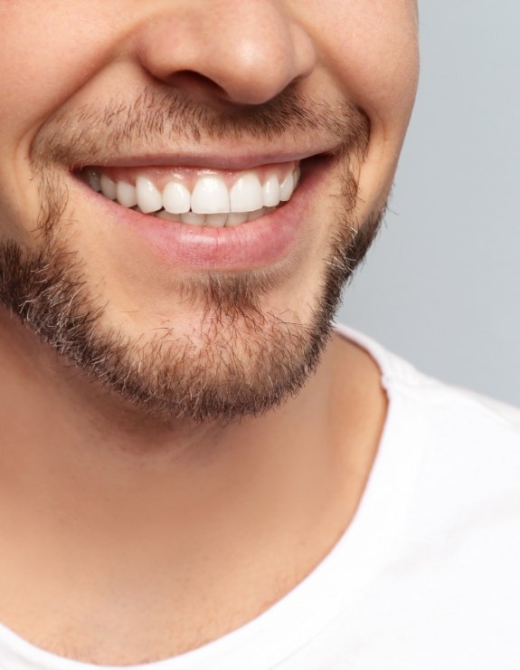 Close up of man with short beard smiling