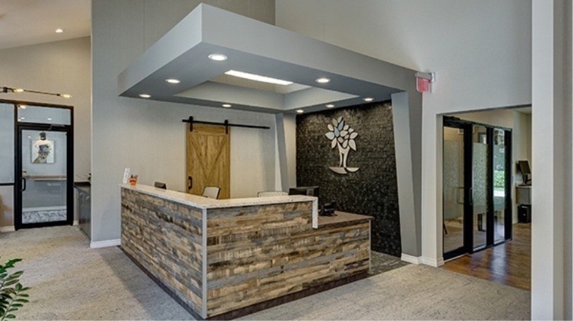 Front desk and reception area at Costello and DeHart Dental Excellence