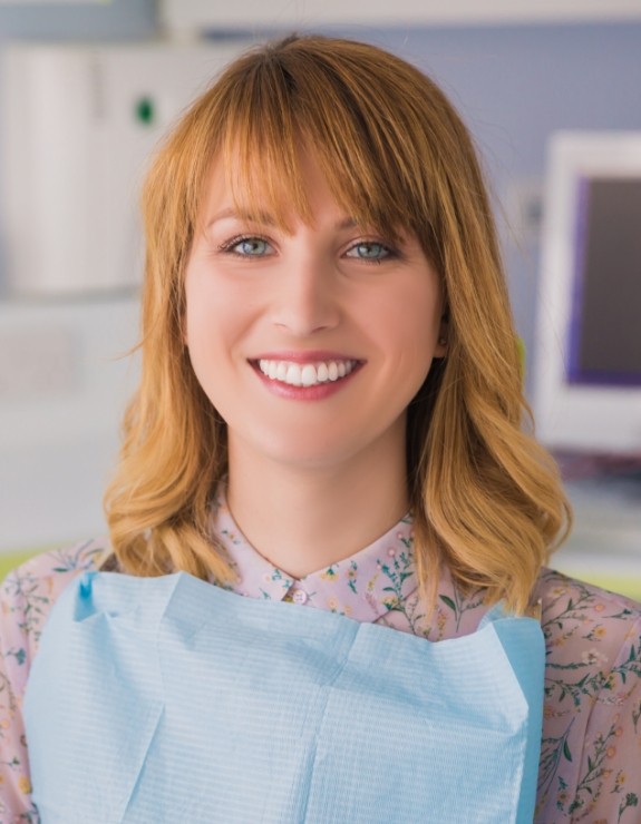 Smiling woman in dental chair