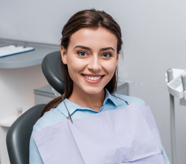 Woman grinning in dental chair