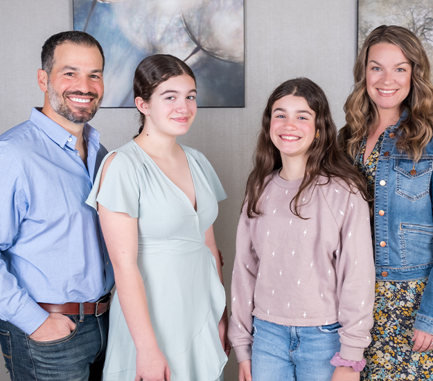 Doctor Costello with his wife and two daughters