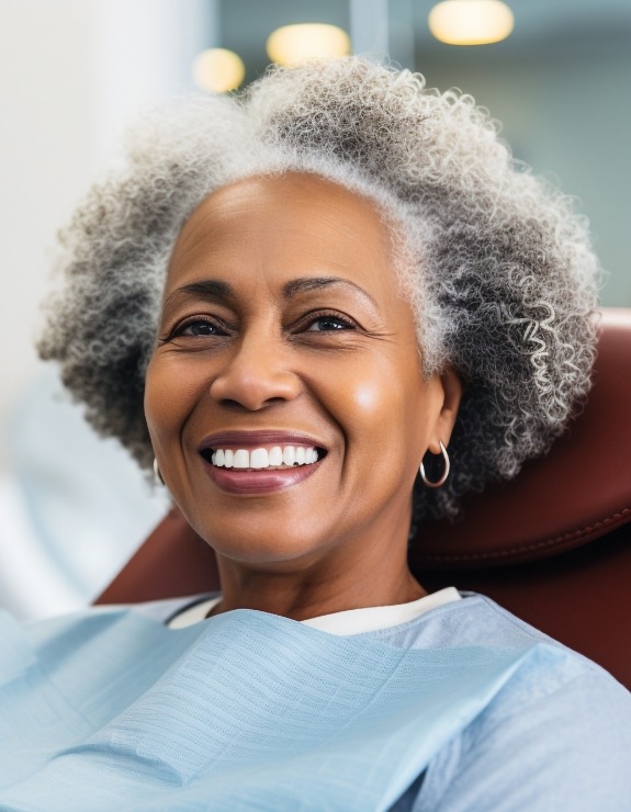 Woman in dental chair during consultation appointment.
