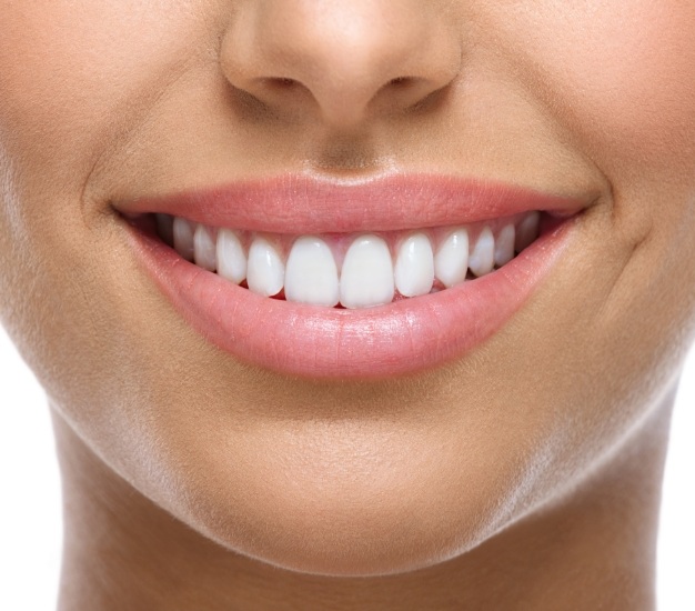 Close up of person with white teeth smiling