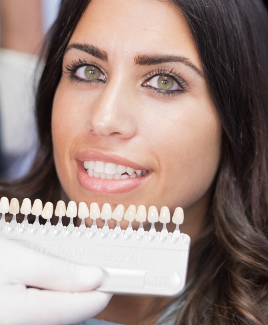 Woman being fitted for veneers by her Arlington Heights cosmetic dentist