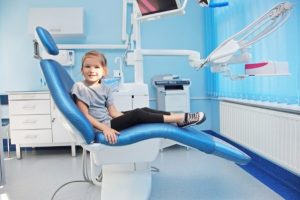 girl in dental chair at children’s dentist in Arlington Heights