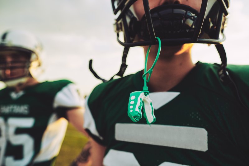 Closeup of athlete in football gear