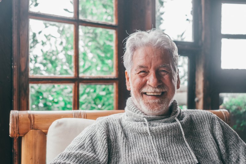 man smiling after getting a bone graft in Arlington Heights