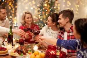 a group of people smiling and celebrating the holidays 