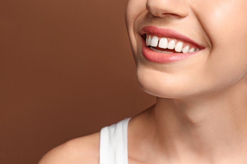 A woman with a gap between her two upper front teeth